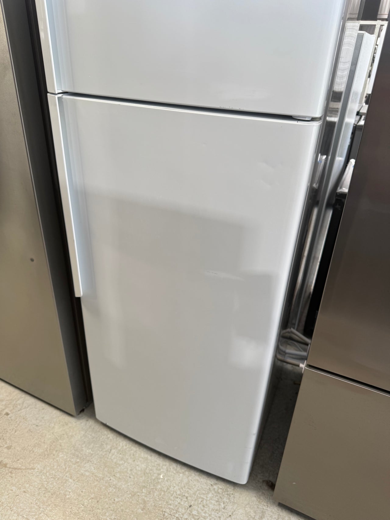 Second hand Fisher & Paykel E411TRT3 411-liter top-mount refrigerator