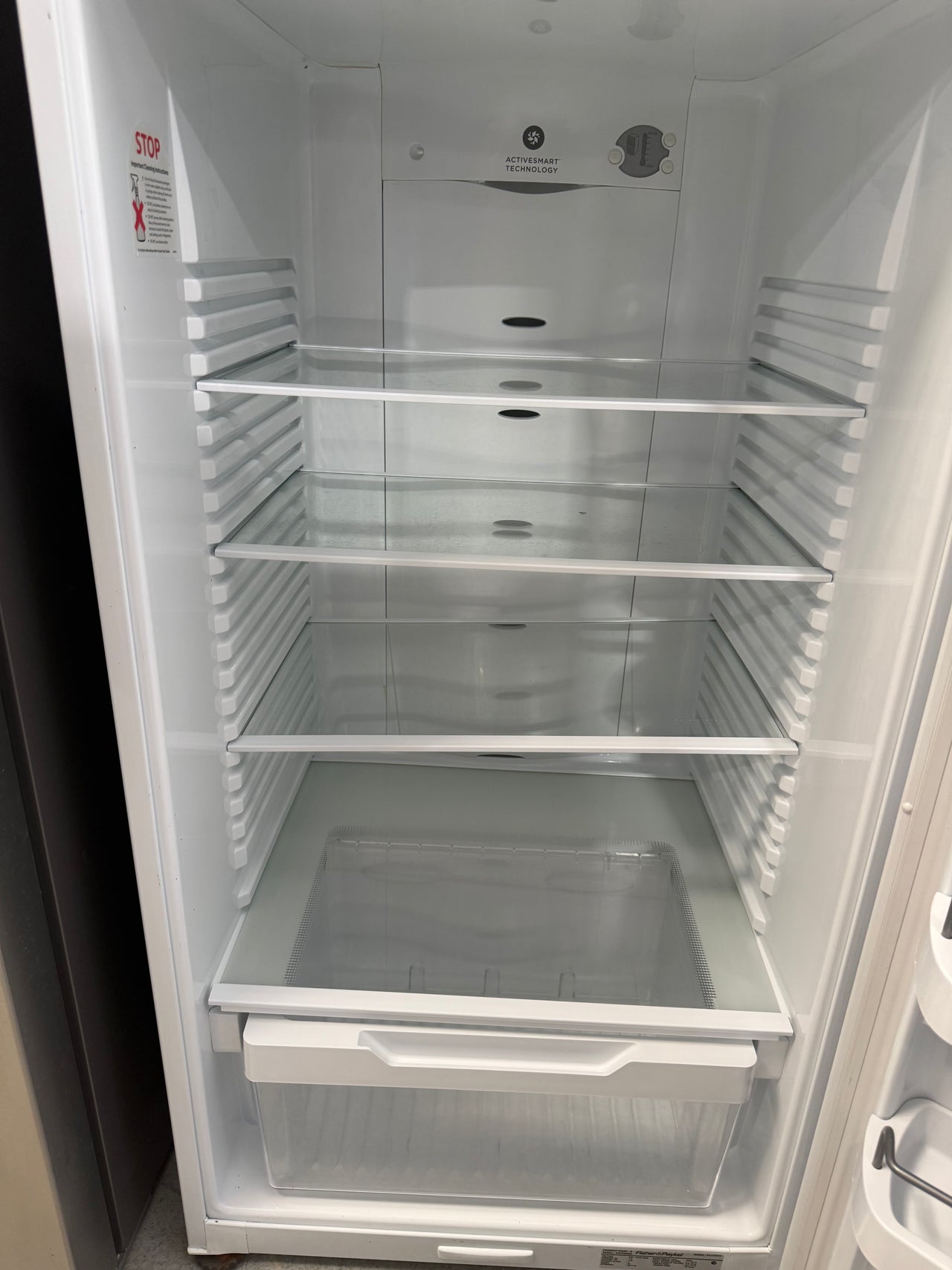 Second hand Fisher & Paykel E411TRT3 411-liter top-mount refrigerator