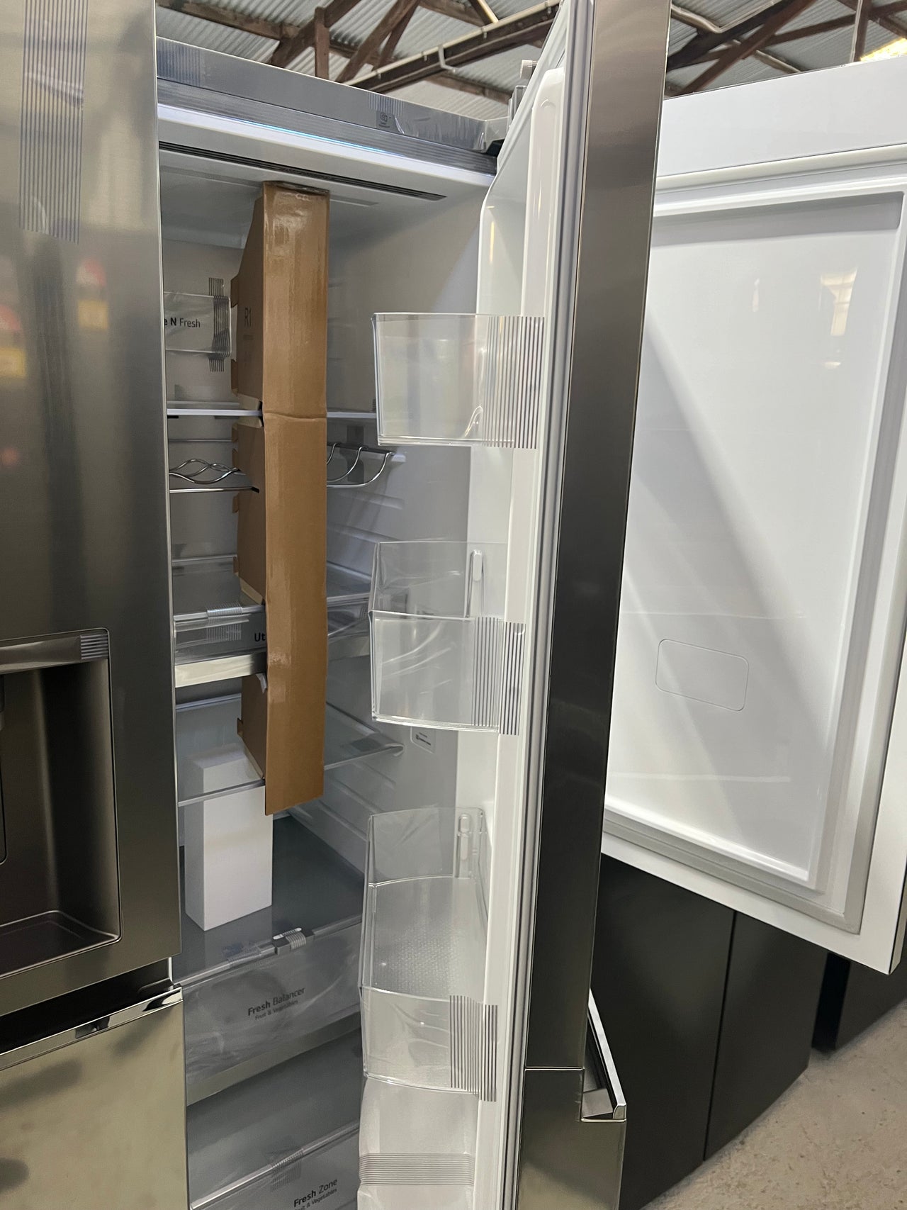 Transportation damaged LG 635L Side By Side Refrigerator in Stainless Finish  Model:GS-D635PLC - Second Hand Appliances Geebung