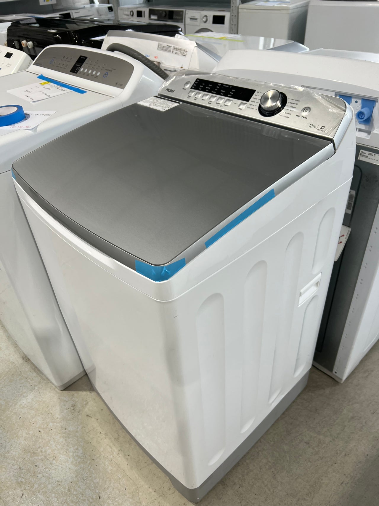 Factory second 10kg Haier Top Loader HWT10AN1 top side - Second Hand Appliances Geebung