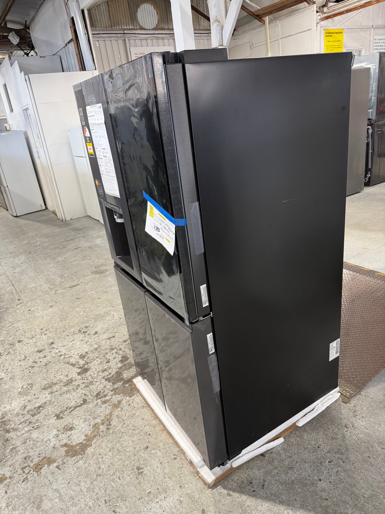 Transportation damaged LG GF-V900MBLC 847-liter French Door refrigerator