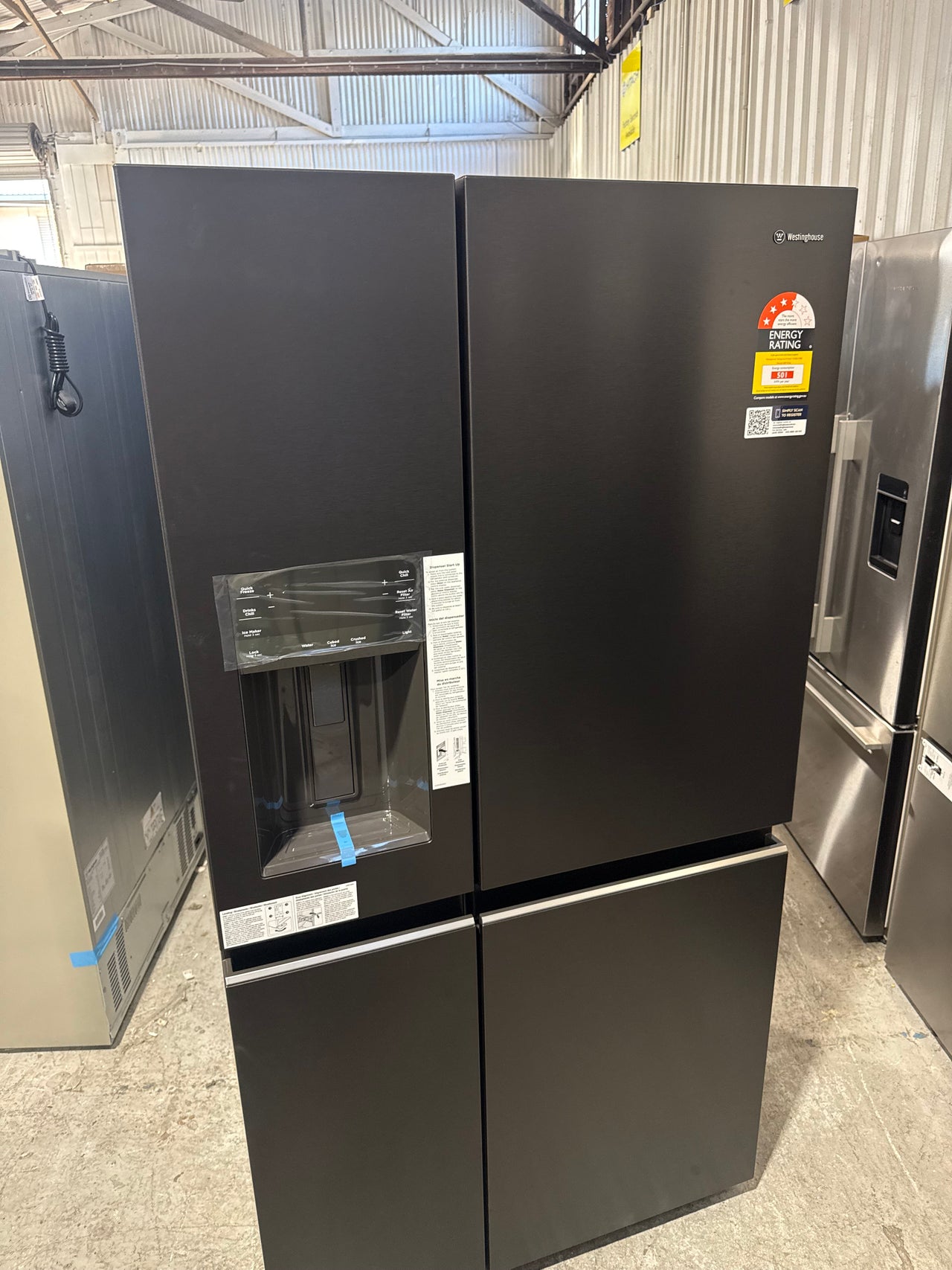 Transportation damaged Westinghouse 609L Quad Door Fridge – WQE6170BB