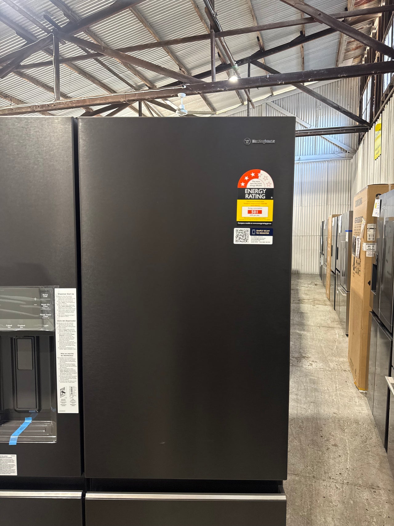 Transportation damaged Westinghouse 609L Quad Door Fridge – WQE6170BB