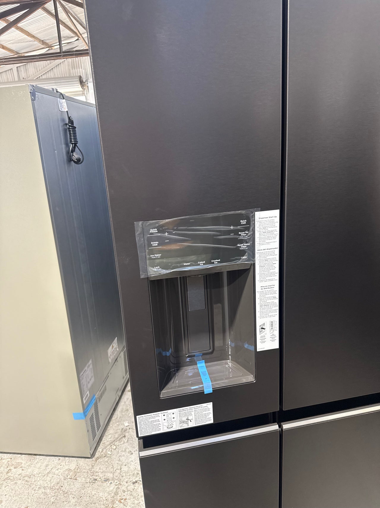 Transportation damaged Westinghouse 609L Quad Door Fridge – WQE6170BB