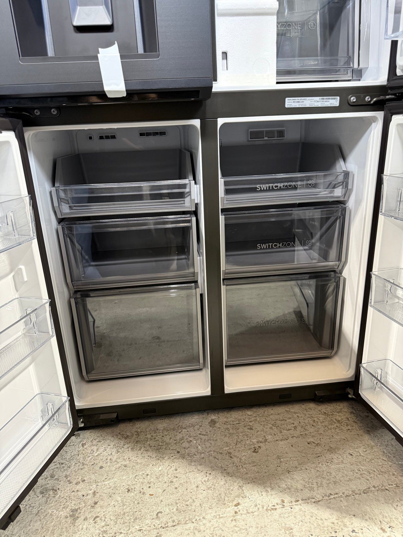 Factory second Haier 601L 600 Series Quad Door Refrigerator Freezer – Matte Black, Ice & Water  Model: HRF680YZC
