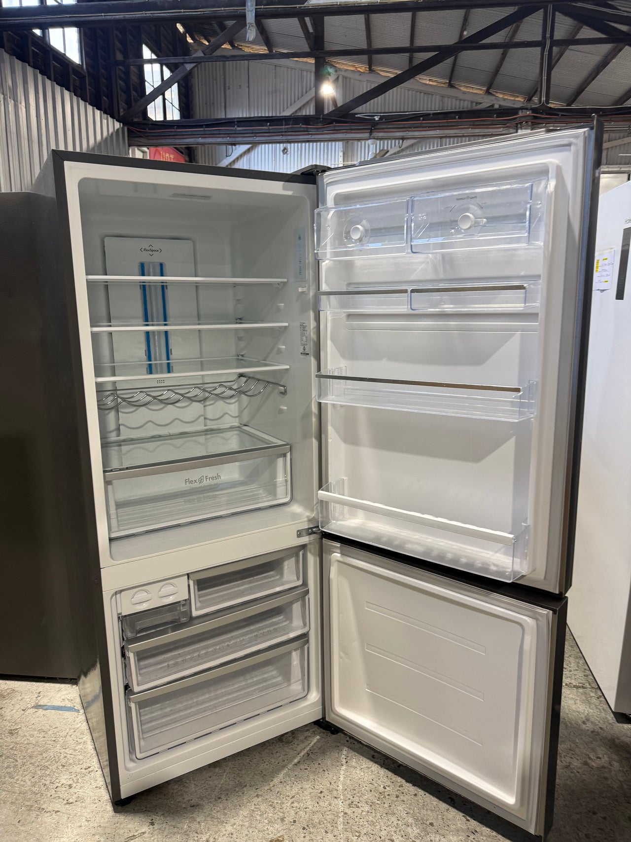 Second hand 453L Westinghouse Stainless Steel Bottom Mount Fridge  Model: WBE4514SA - Second Hand Appliances Geebung