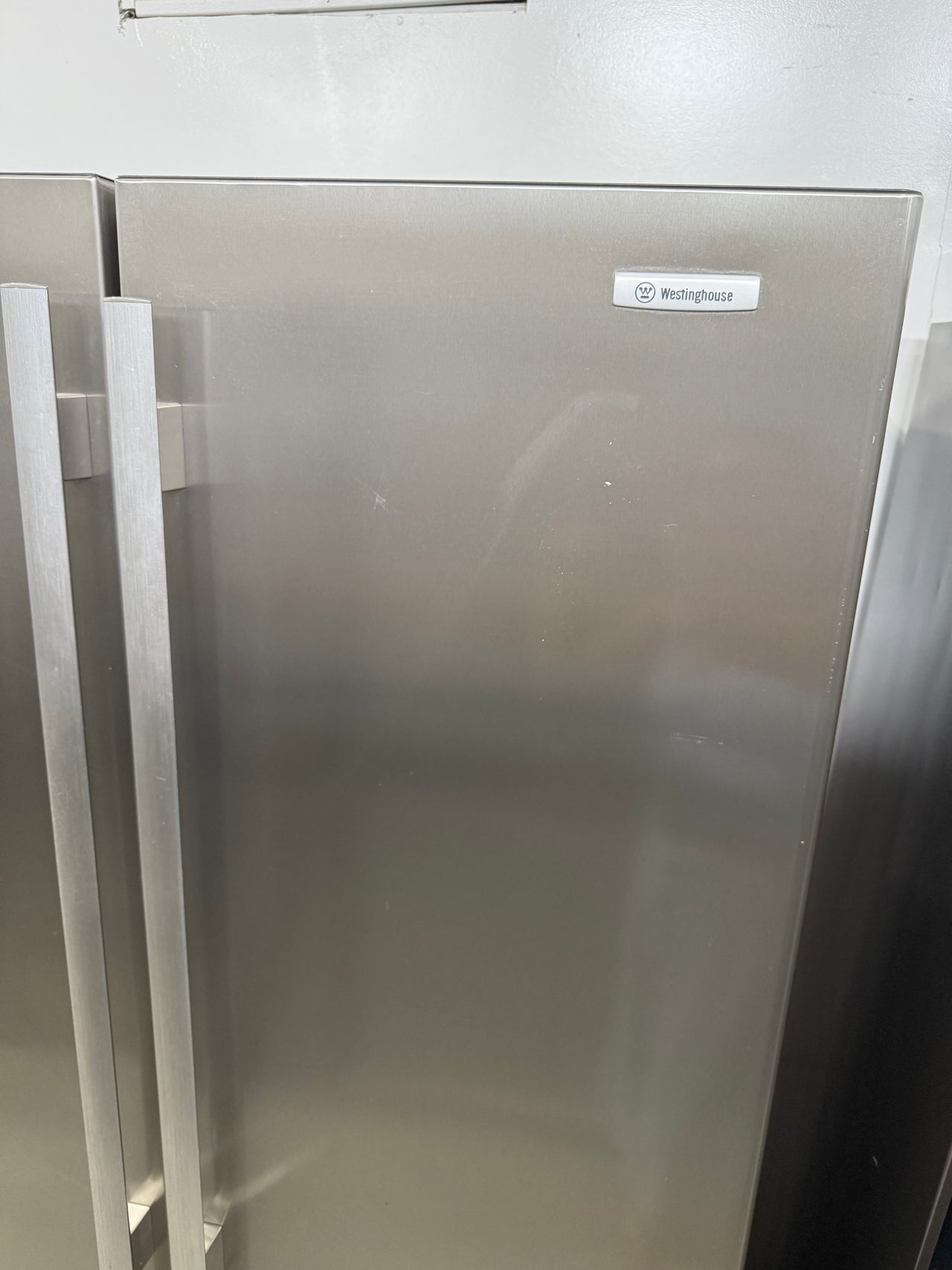 Second hand 606L Westinghouse Side By Side Fridge Model: WSE6100SA - Second Hand Appliances Geebung
