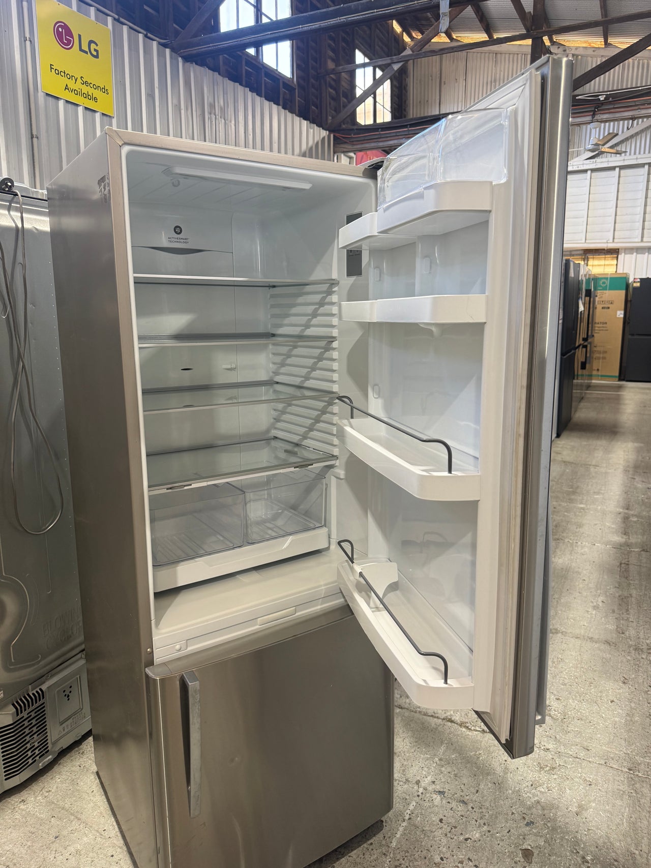 Second hand Fisher&Paykel 403l bottom mounted fridge freezer E402BRX4 - Second Hand Appliances Geebung