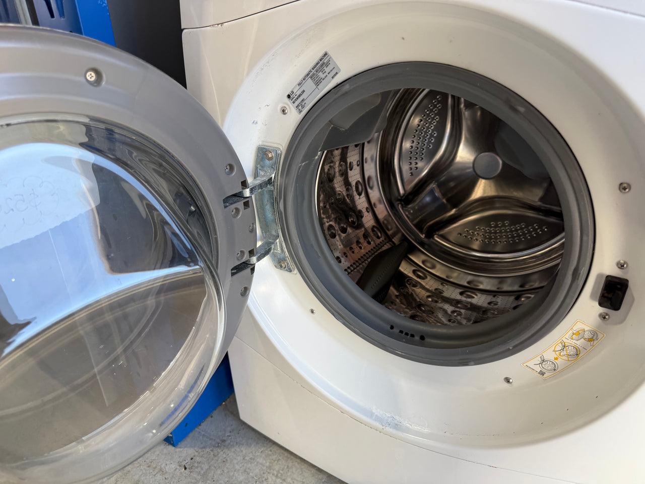 Second hand LG WD1410SBW 10kg front load washing machine - Second Hand Appliances Geebung