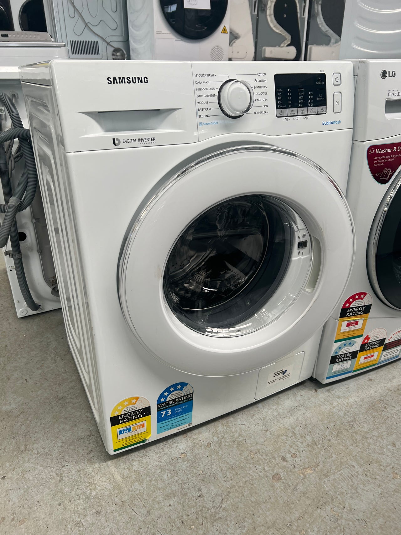 Second hand SAMSUNG 8.5KG BUBBLEWASH FRONT LOAD WASHING MACHINE WITH STEAM  Model: WW85J54E0IW - Second Hand Appliances Geebung inside