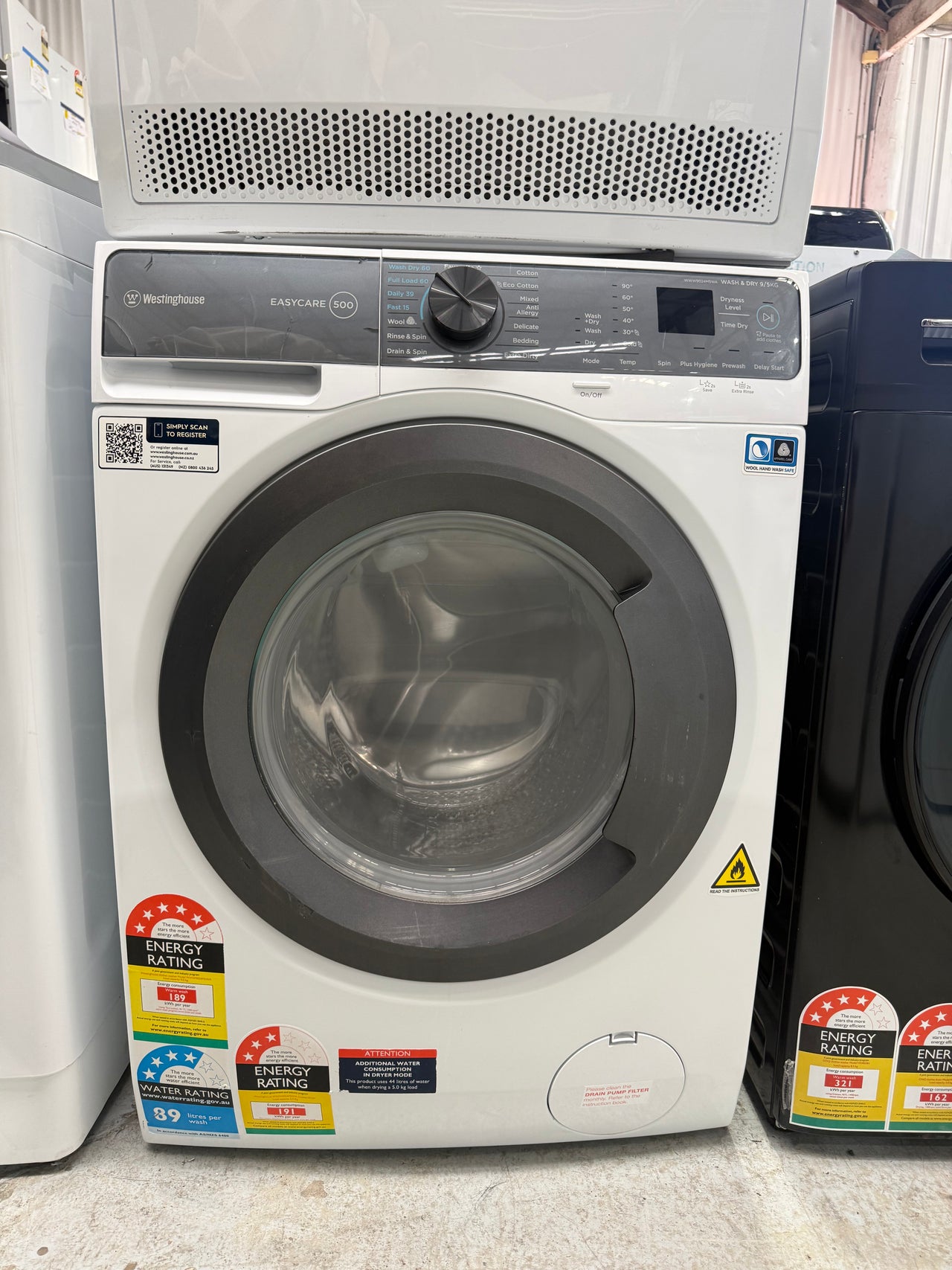 Second hand Westinghouse 9kg/5kg EasyCare Front Load Washer Dryer Combo WWW9024M5WA - Second Hand Appliances Geebung