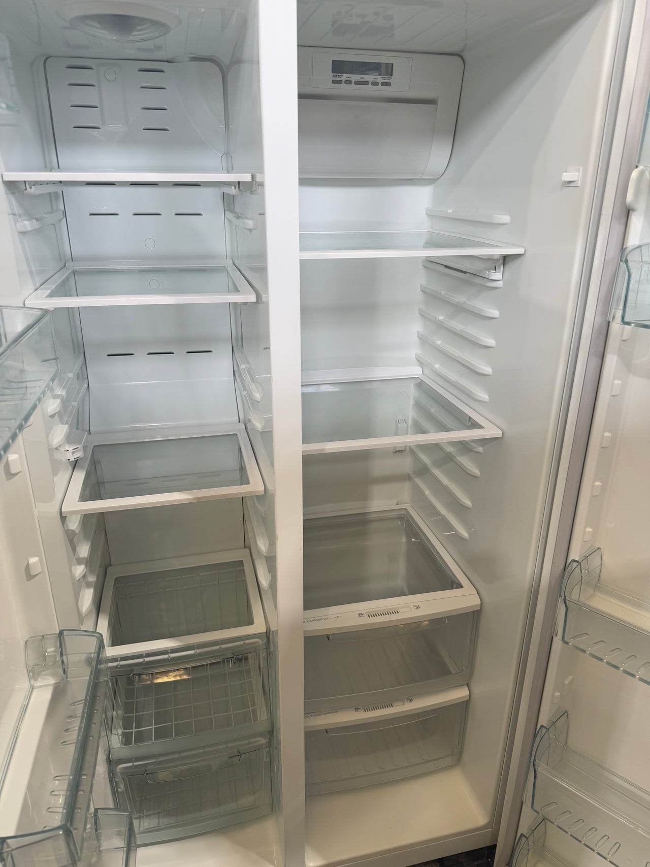 Second hand Westinghouse WSE6100WA 610-liter side-by-side refrigerator-freezer - Second Hand Appliances Geebung