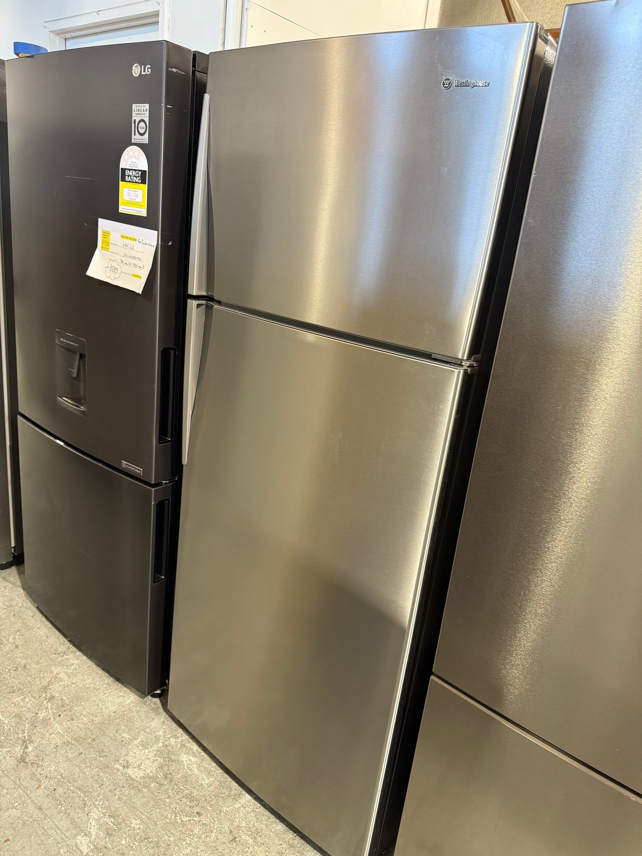 Second hand Westinghouse WTM3900SB 390-liter top-mount refrigerator - Second Hand Appliances Geebung