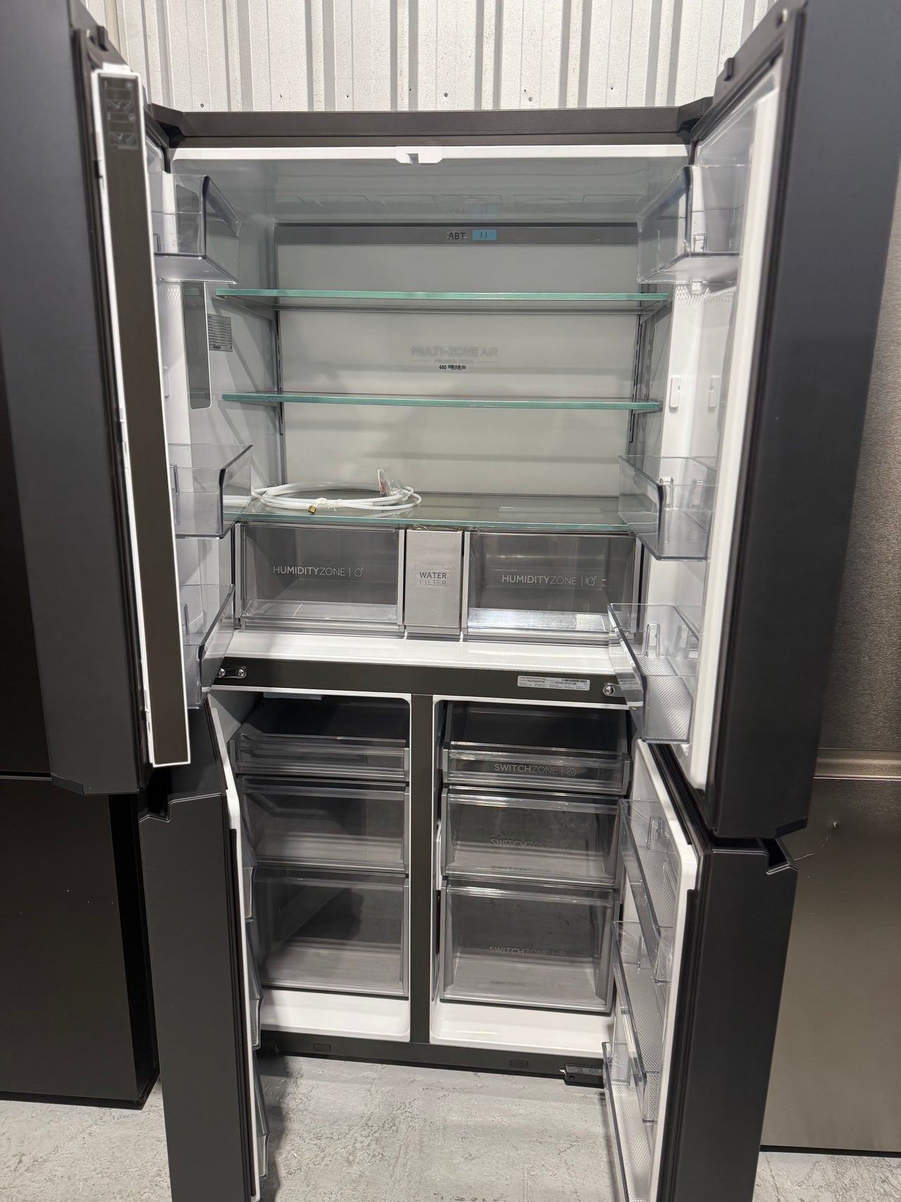 Transportation damaged Haie 623L Quad Door Refrigerator Model: HRF680YPC - Second Hand Appliances Geebung