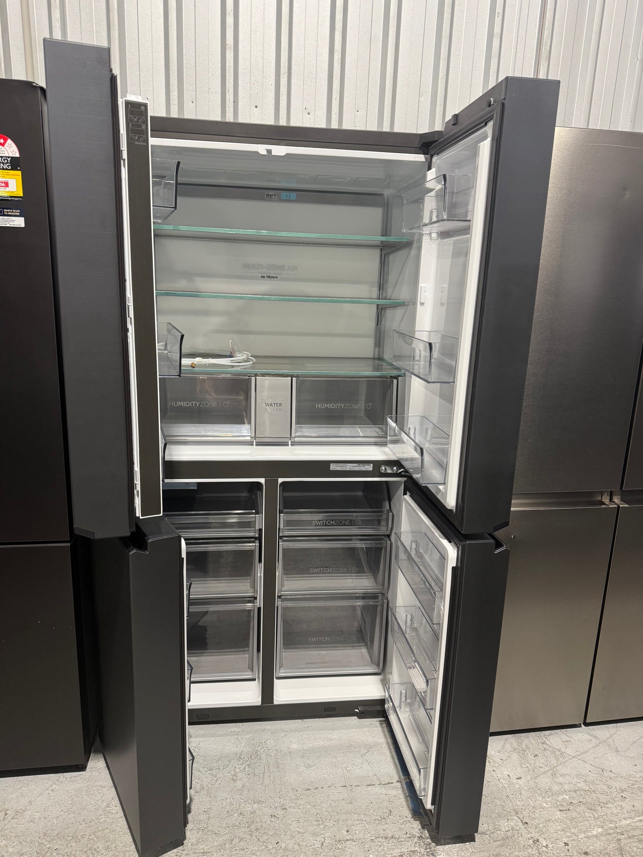 Transportation damaged Haie 623L Quad Door Refrigerator Model: HRF680YPC - Second Hand Appliances Geebung