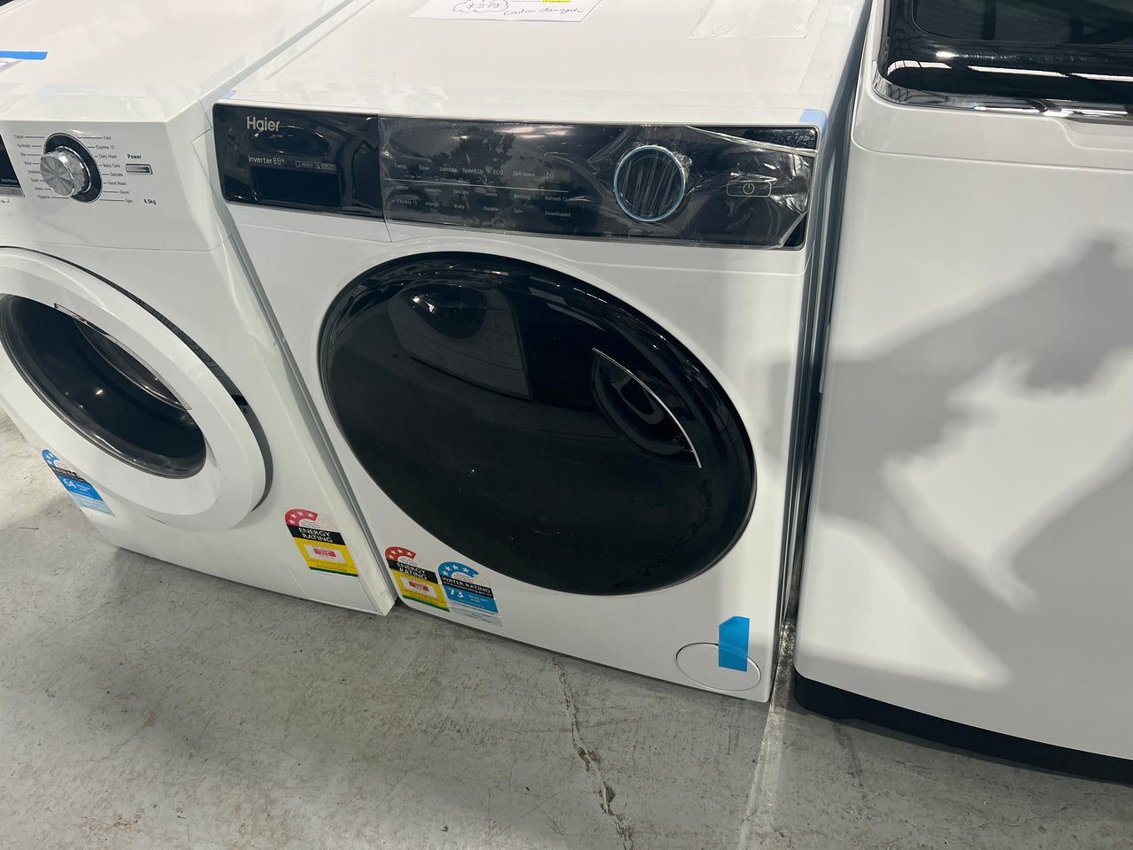 Transportation damaged 8,5 kg Haier front loader HWF85AN1 - Second Hand Appliances Geebung