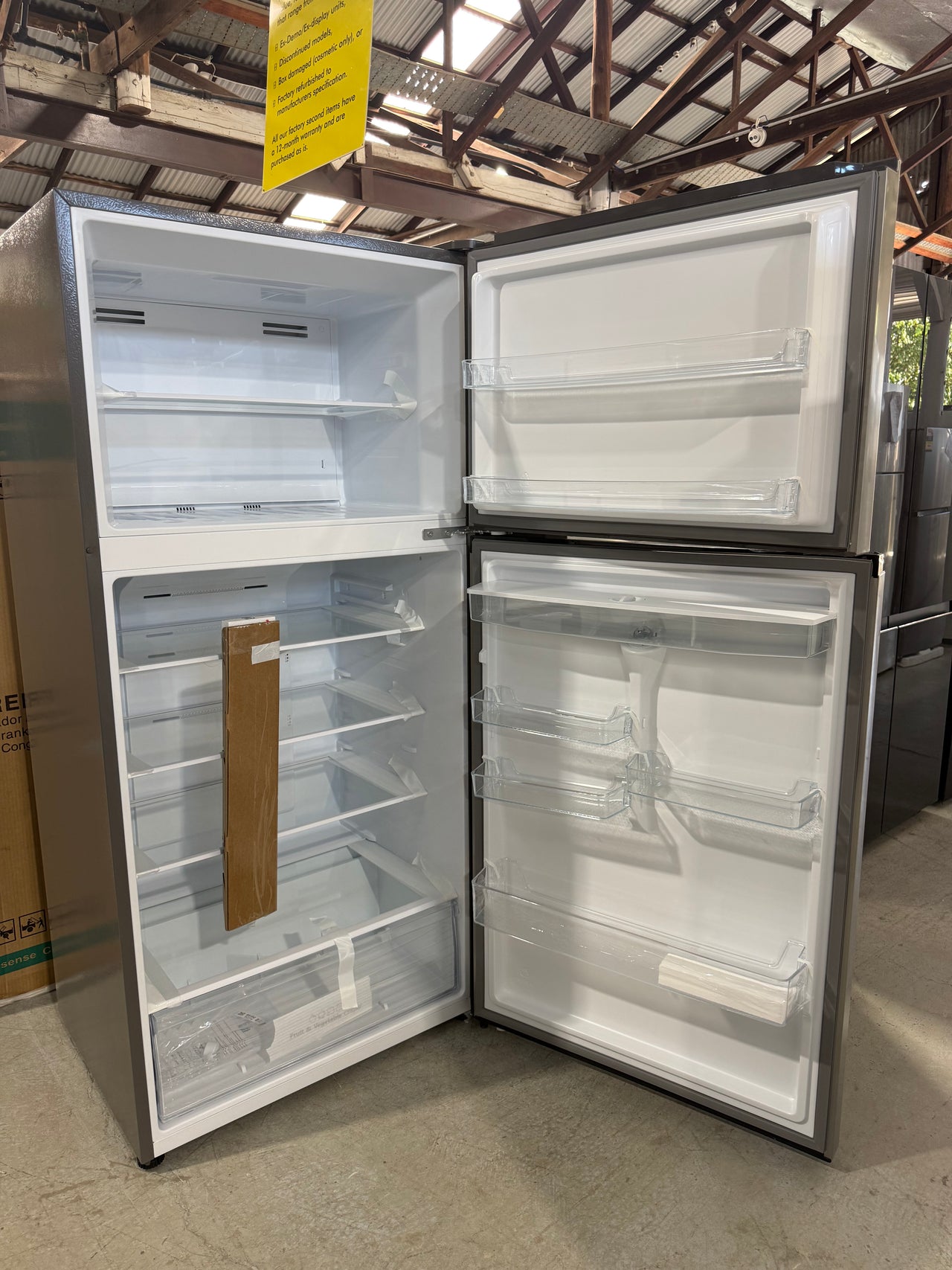 Transportation damaged Hisense 496L Top Mount refrigerator HRTF496SW - Second Hand Appliances Geebung