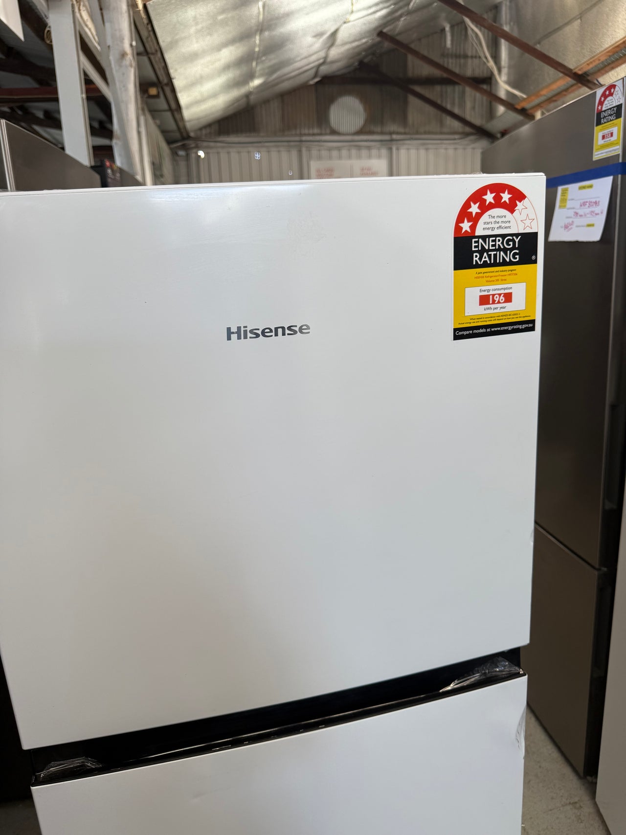 Transportation damaged Hisense HRTF206 205L Top Mount Refrigerator – White - Second Hand Appliances Geebung