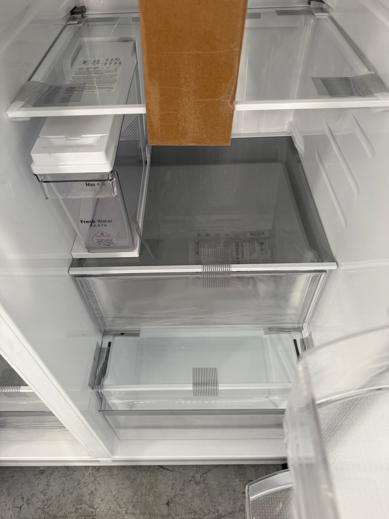 Transportation damaged LG GS-N599PL 641-liter side-by-side refrigerator - Second Hand Appliances Geebung