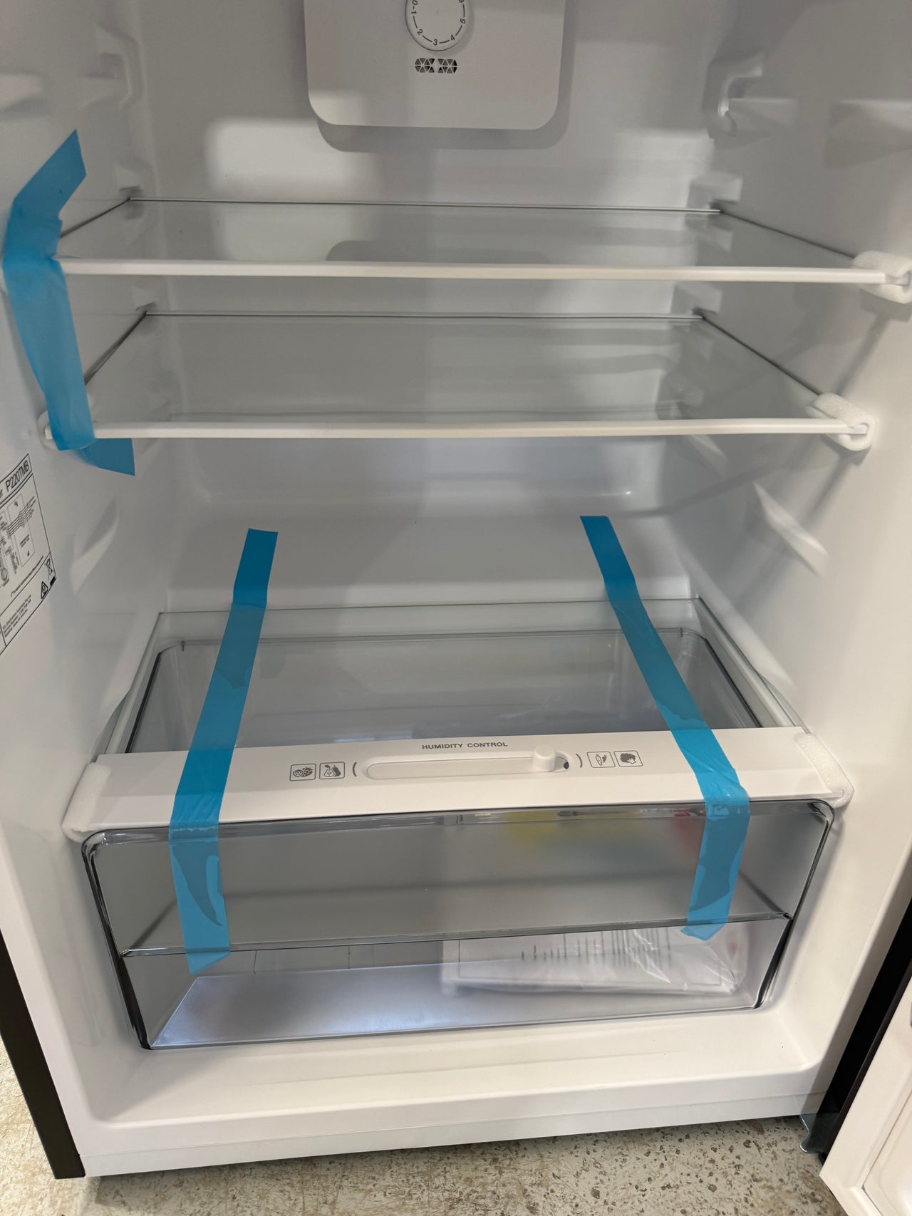 Transportation damaged TCL P220TMB 197-litre top mount refrigerator - Second Hand Appliances Geebung