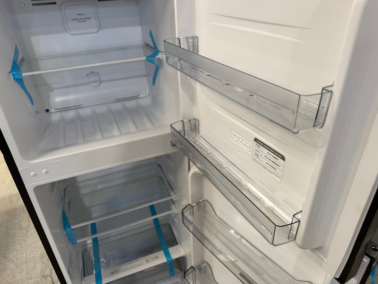 Transportation damaged TCL P220TMB 197-litre top mount refrigerator - Second Hand Appliances Geebung