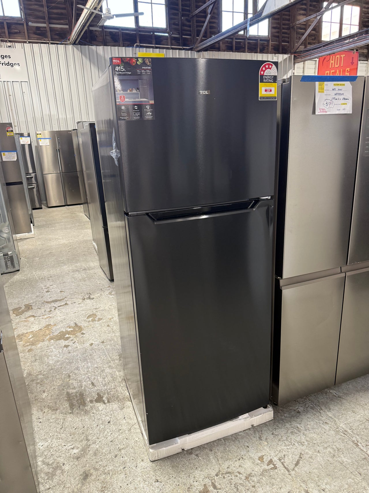 Transportation damaged TCL P454TMB 415L Top Mount Fridge - Second Hand Appliances Geebung