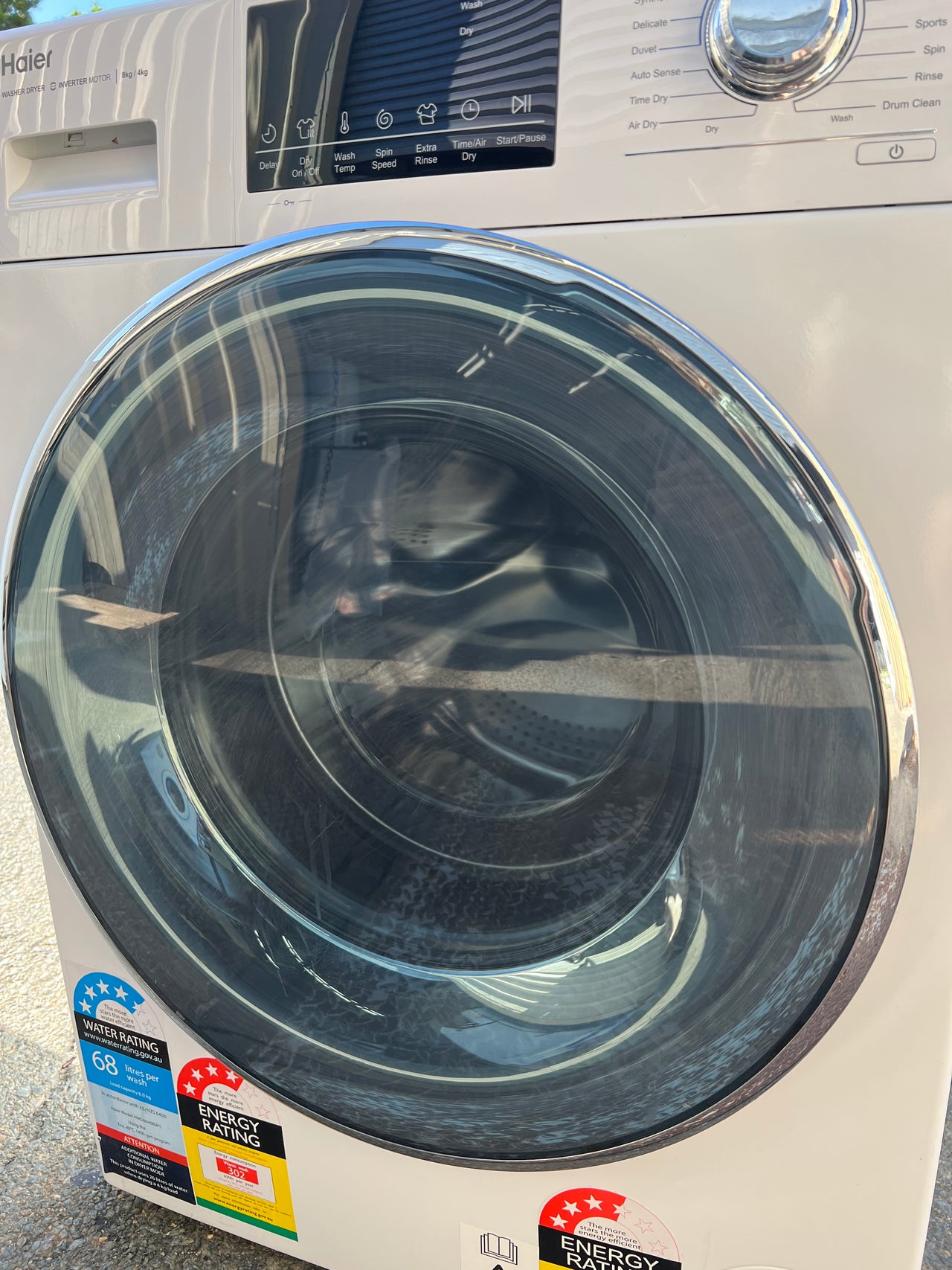 Factory second Haier HWD8040BW1 8kg/4kg Front Load Washer & Dryer Combo - Second Hand Appliances Geebung