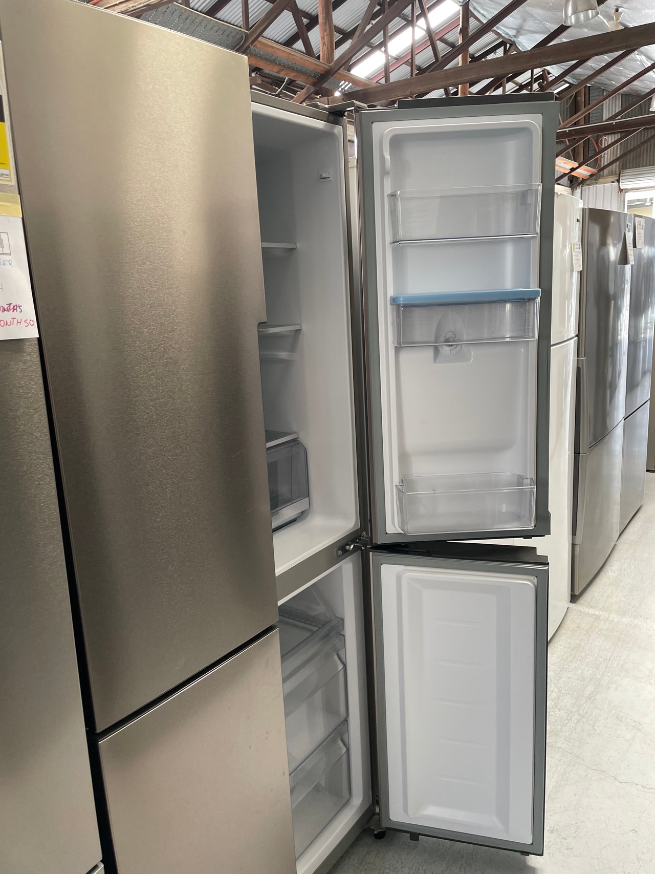 Second hand Haier 466L Quad Door Fridge with Water Dispenser Stainless