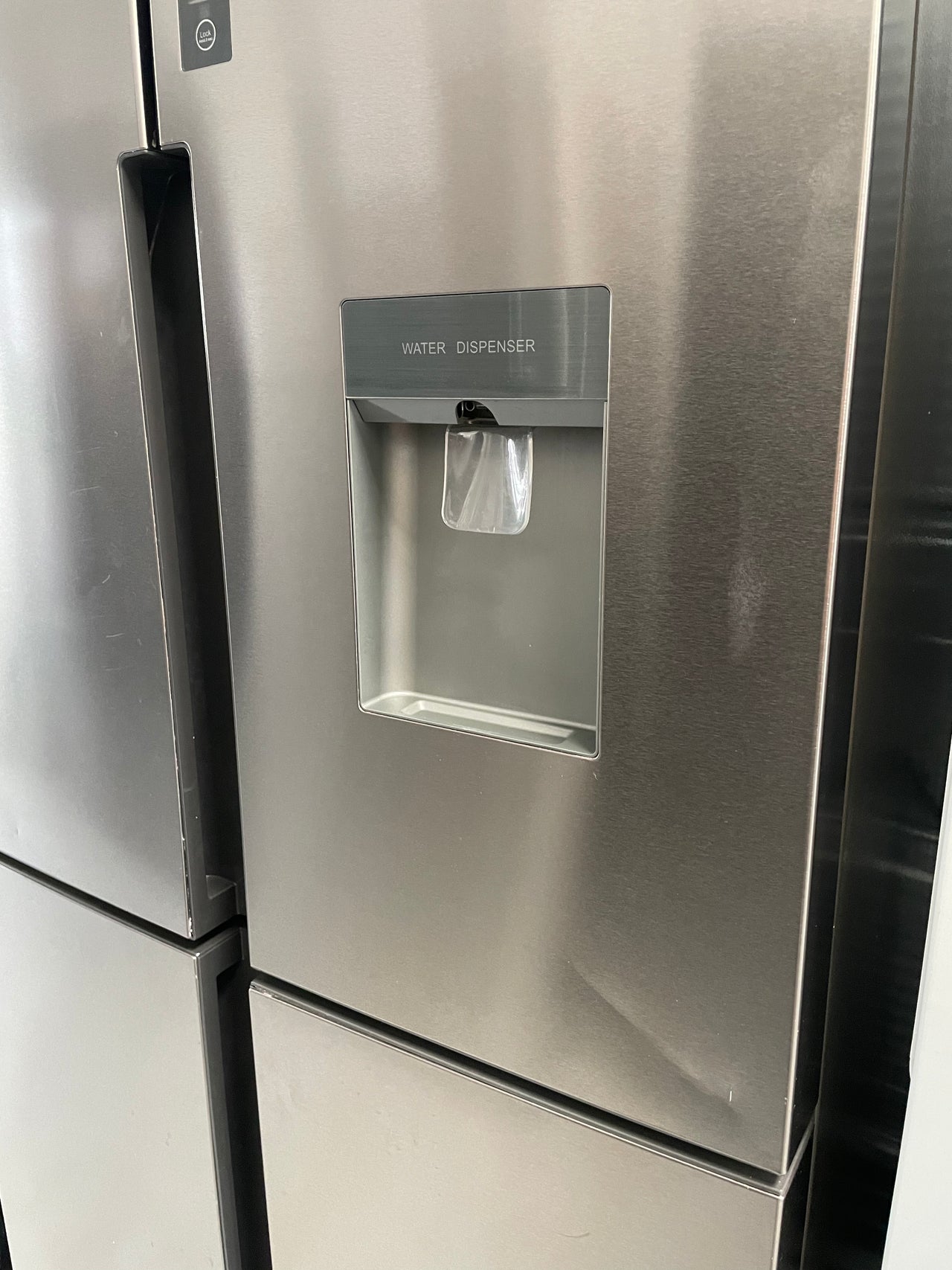 Second hand Haier 466L Quad Door Fridge with Water Dispenser Stainless