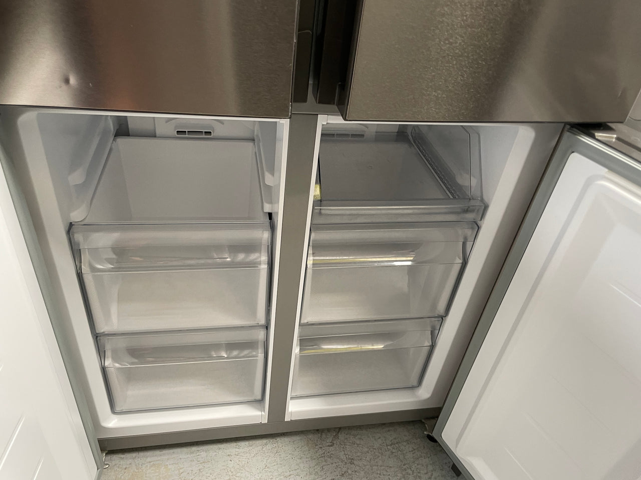 Second hand Haier 466L Quad Door Fridge with Water Dispenser Stainless