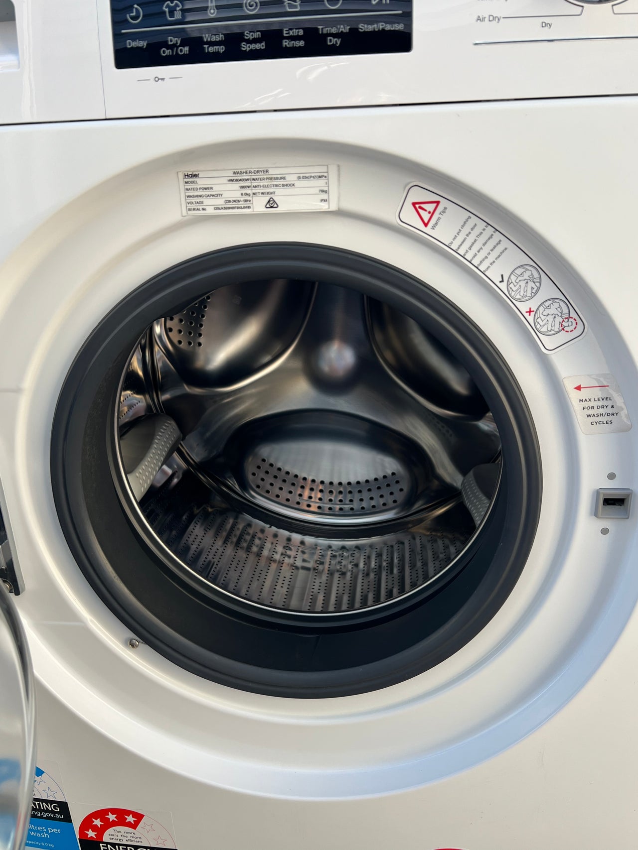 Factory second Haier HWD8040BW1 8kg/4kg Front Load Washer & Dryer Combo - Second Hand Appliances Geebung