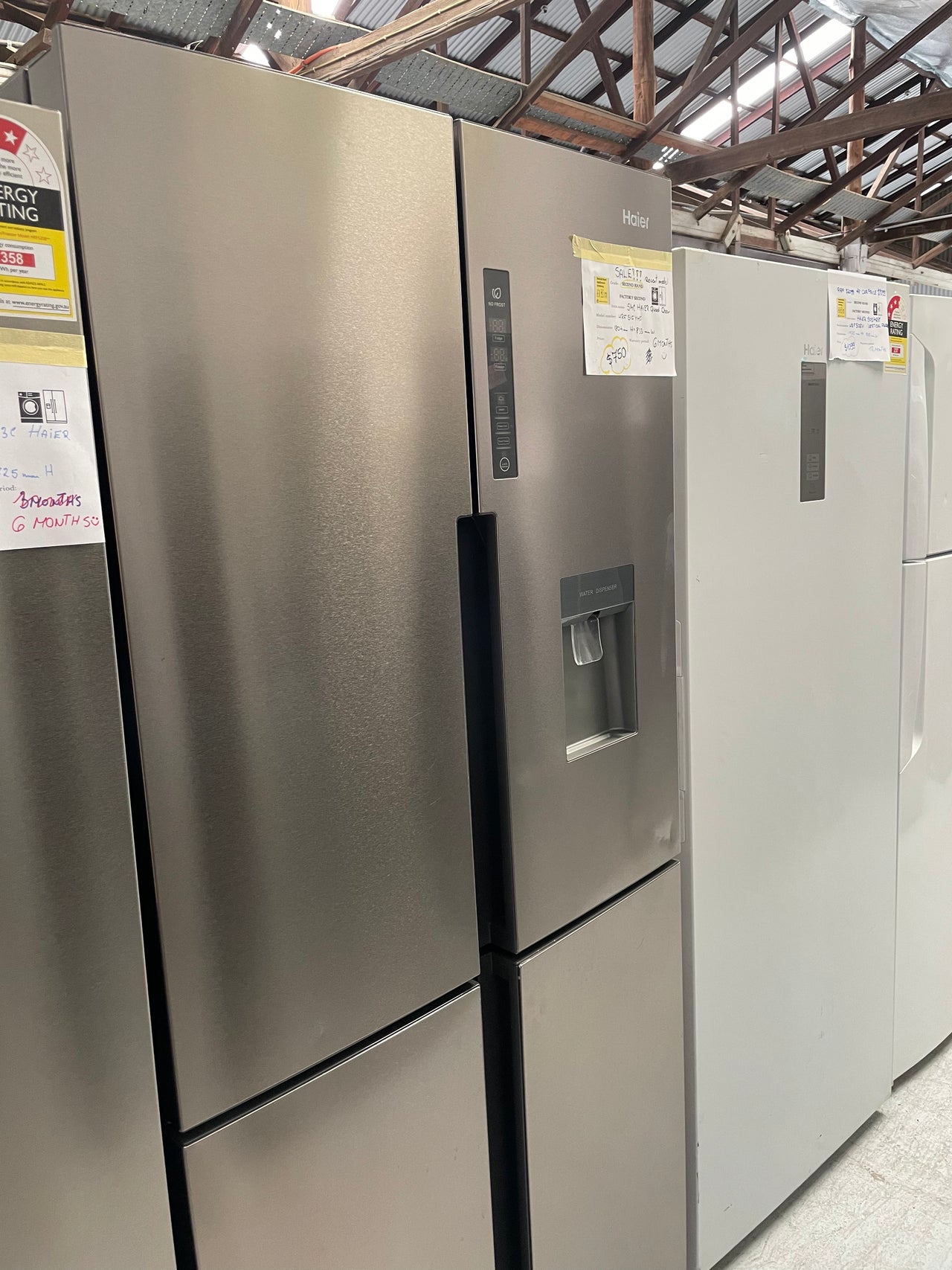 Second hand Haier 466L Quad Door Fridge with Water Dispenser Stainless