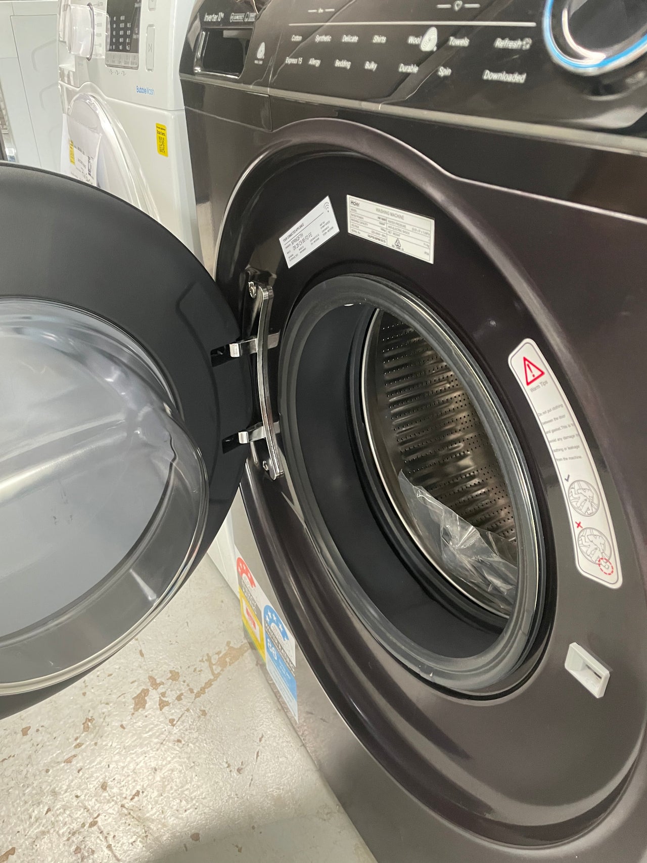 Factory second Haier 10kg Front Loader HWF10ANB1 - Second Hand Appliances Geebung